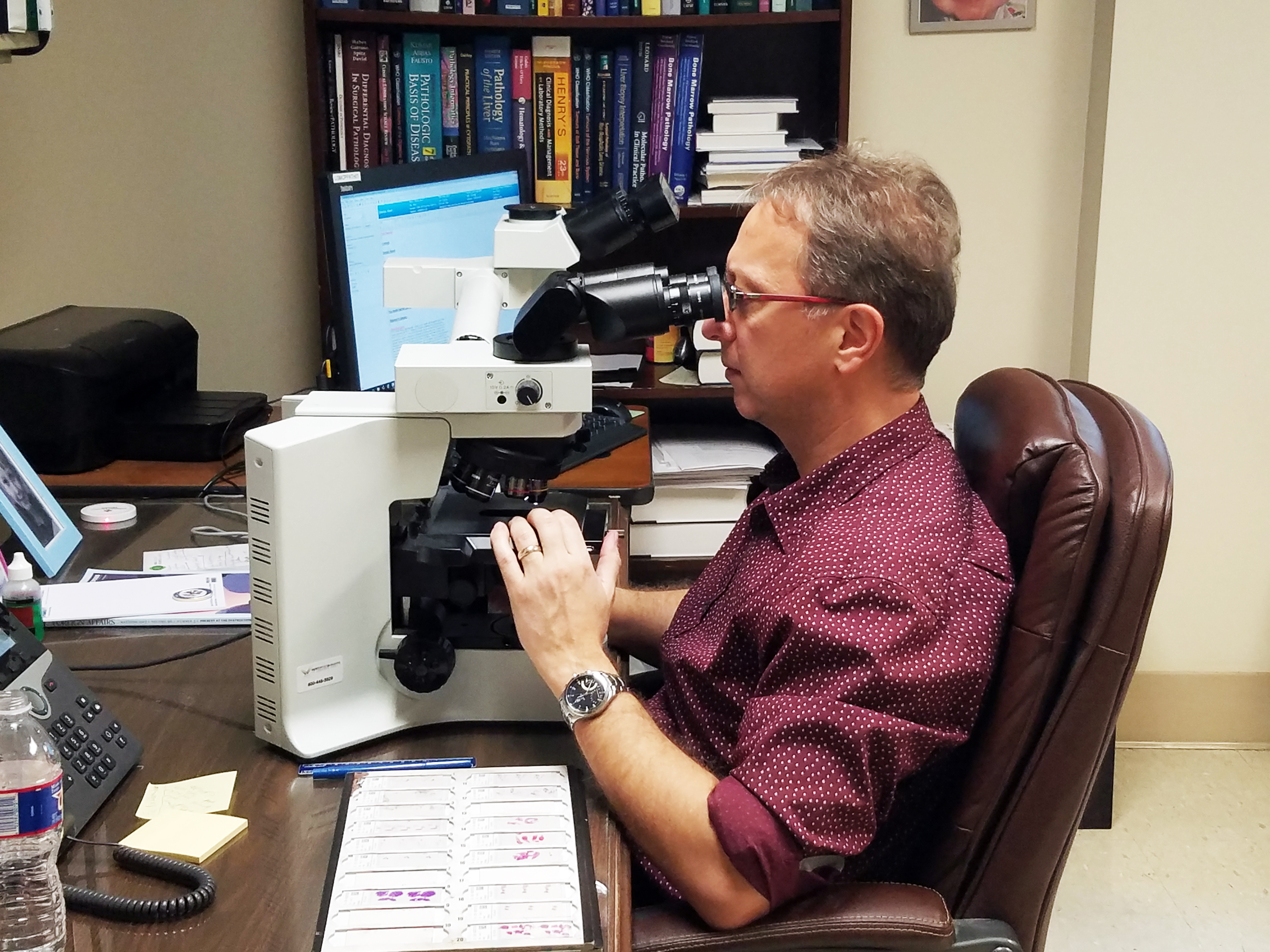 Doctor reviewing medical samples